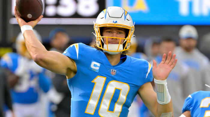 Chargers quarterback Justin Herbert passes the ball
